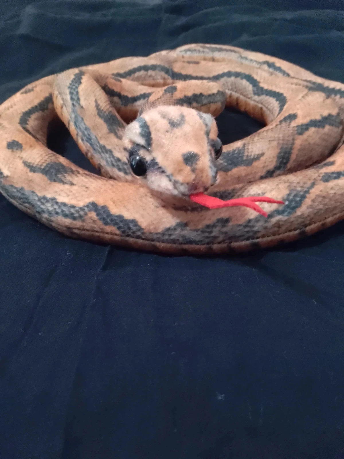 Grande Peluche serpent enroulé